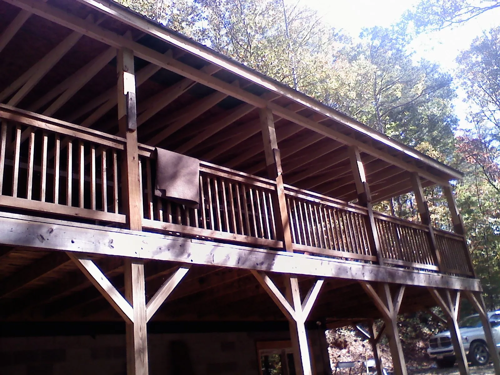 Timber framing under a new elevated porch and deck — Roof Leak Repair in Dibble by Roofing Brothers